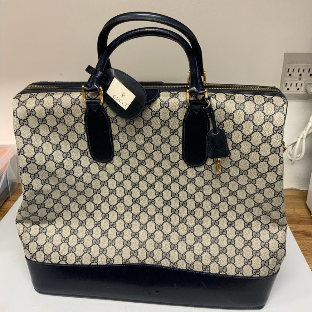 Authentic Gucci GG Vintage travel handbag PVC leather.